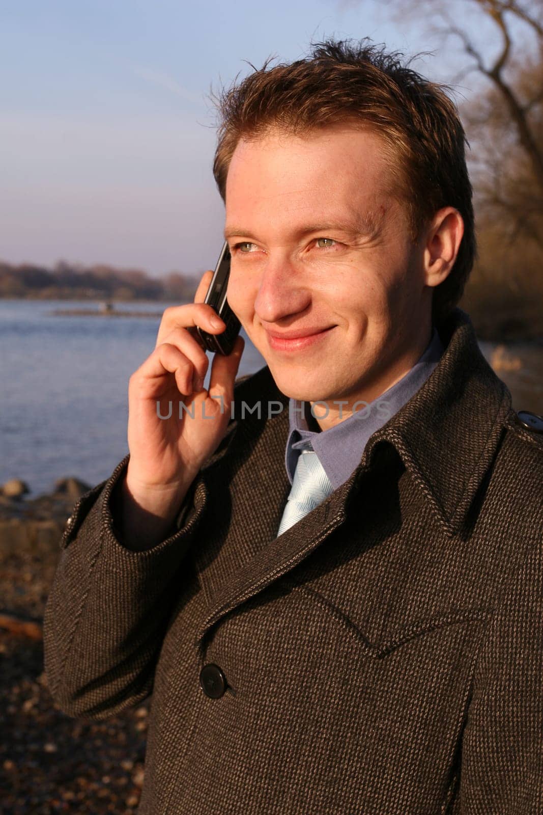 Man talking on the phone outside