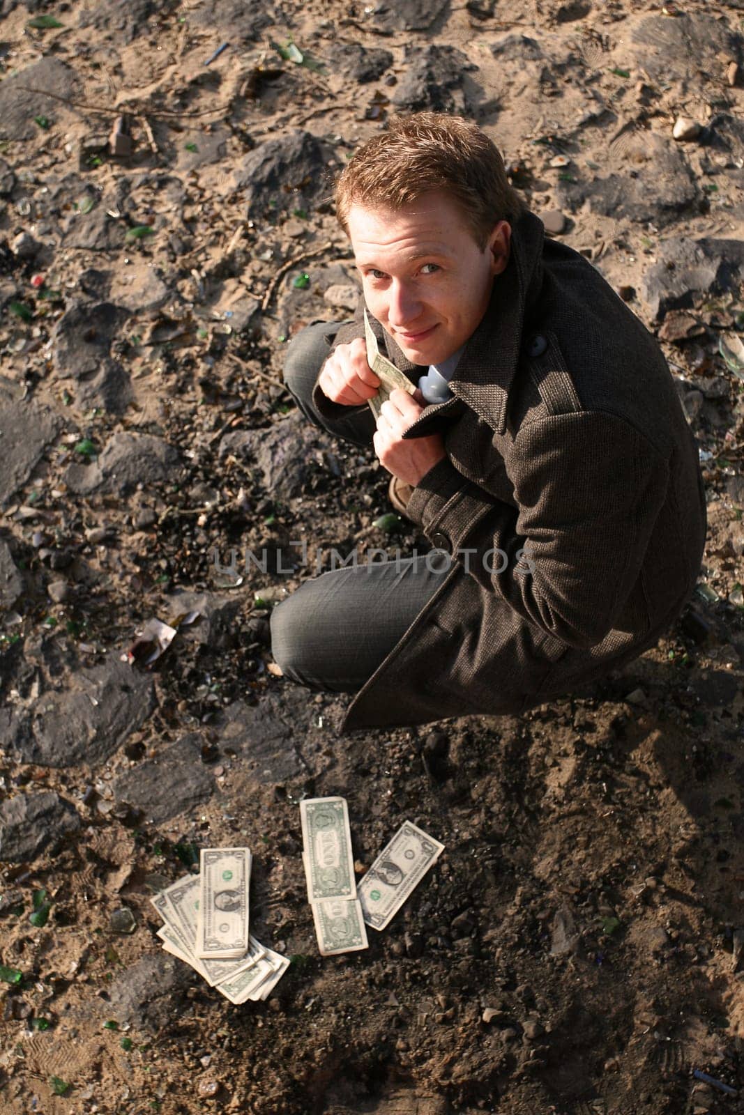 Man hiding money