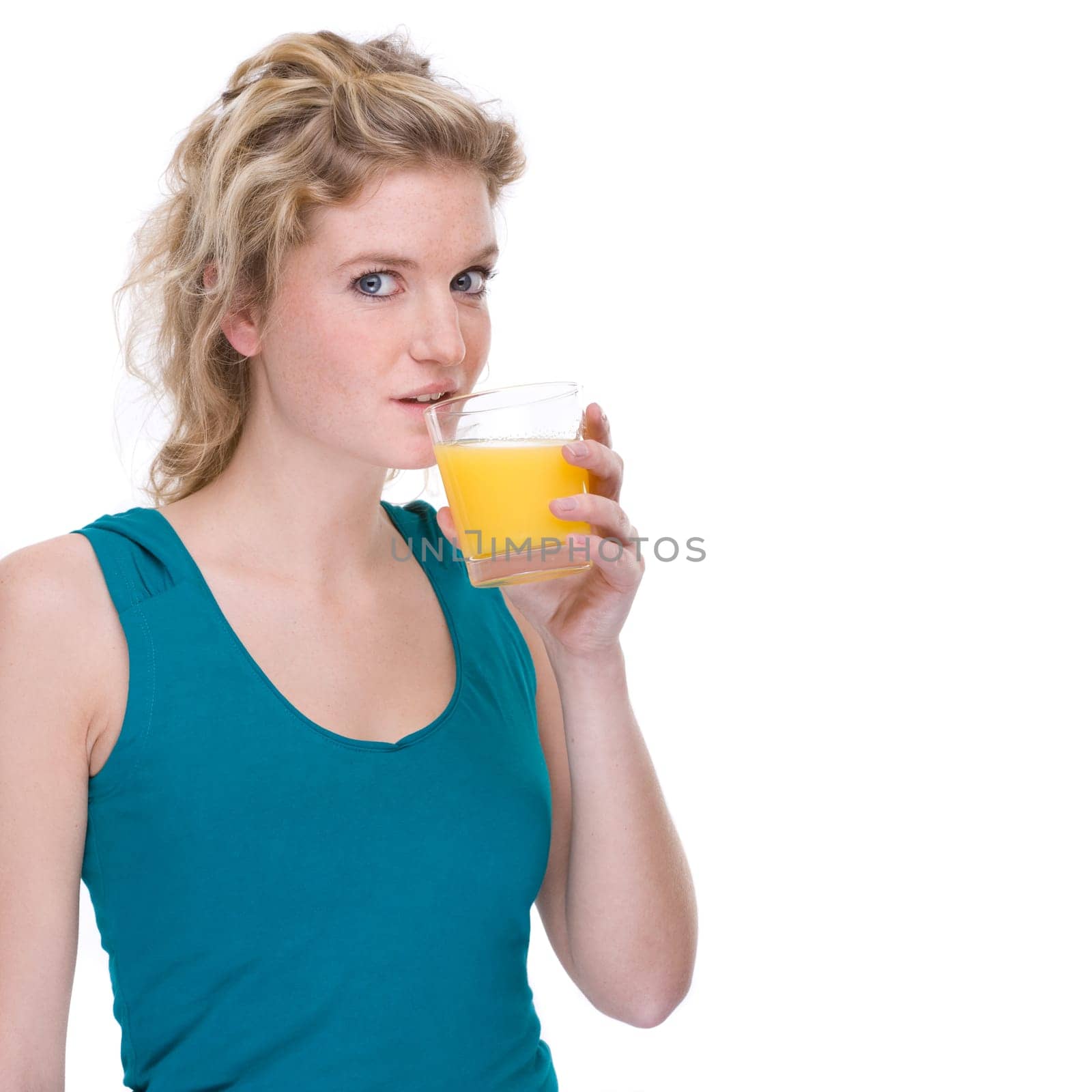 Young woman with glass of orange juice
