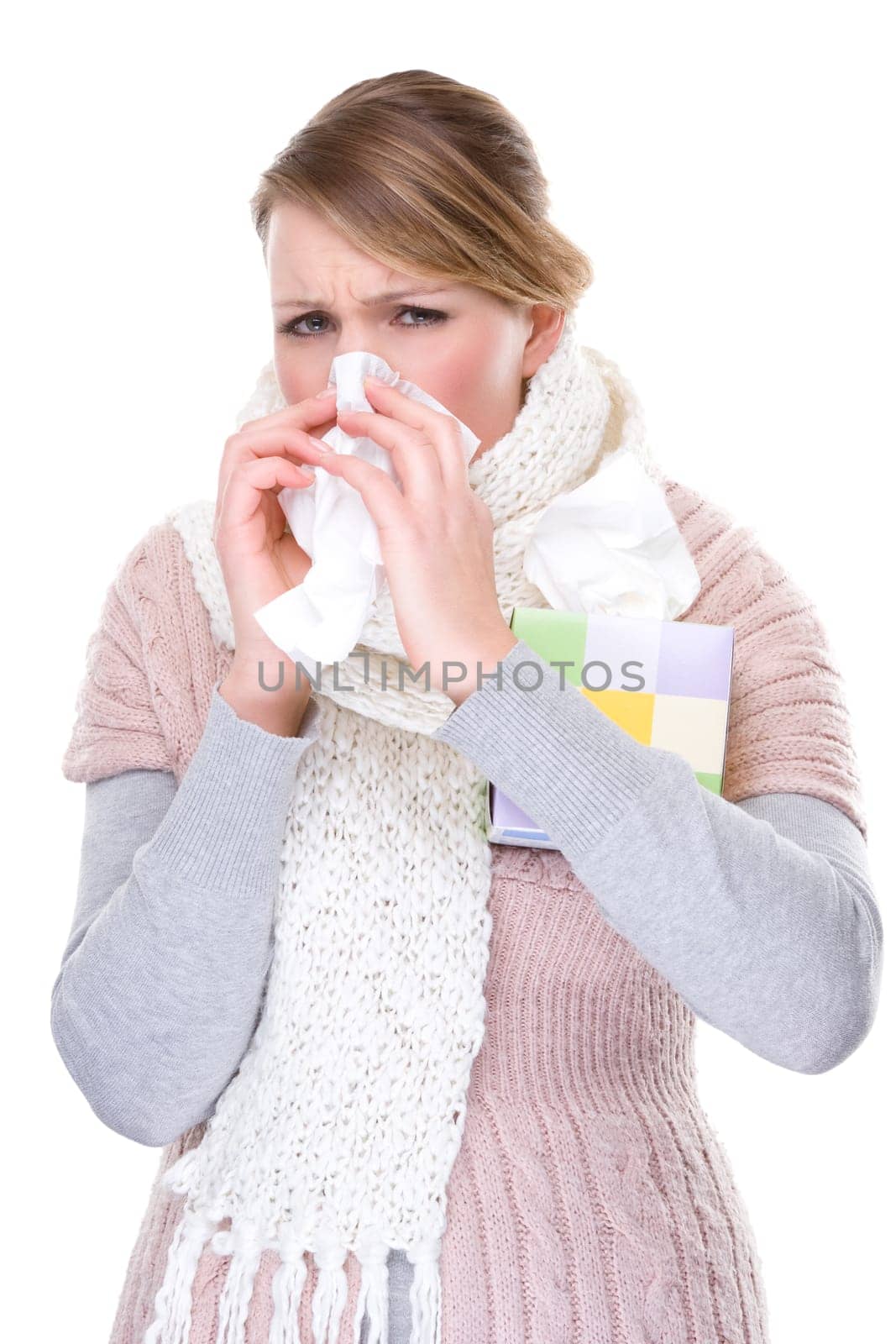 Woman blowing her nose