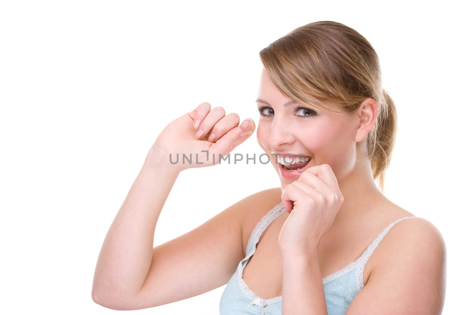 Young woman with dental floss