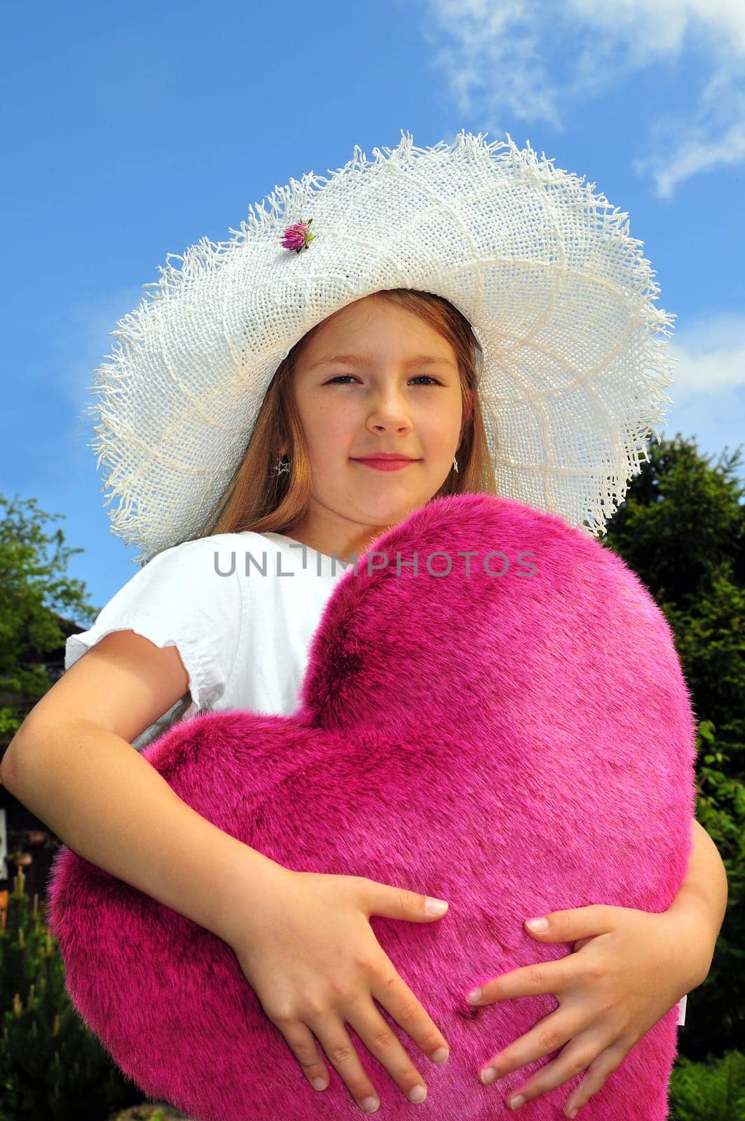 Girl with heart straw hat