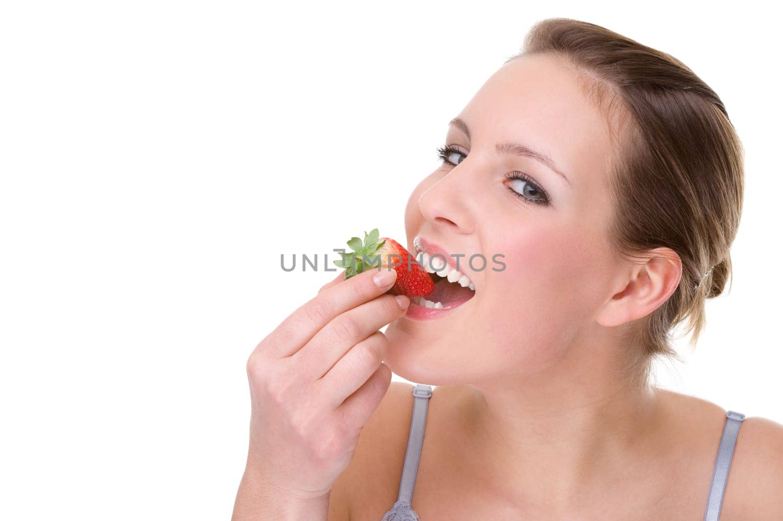 Young woman with strawberry