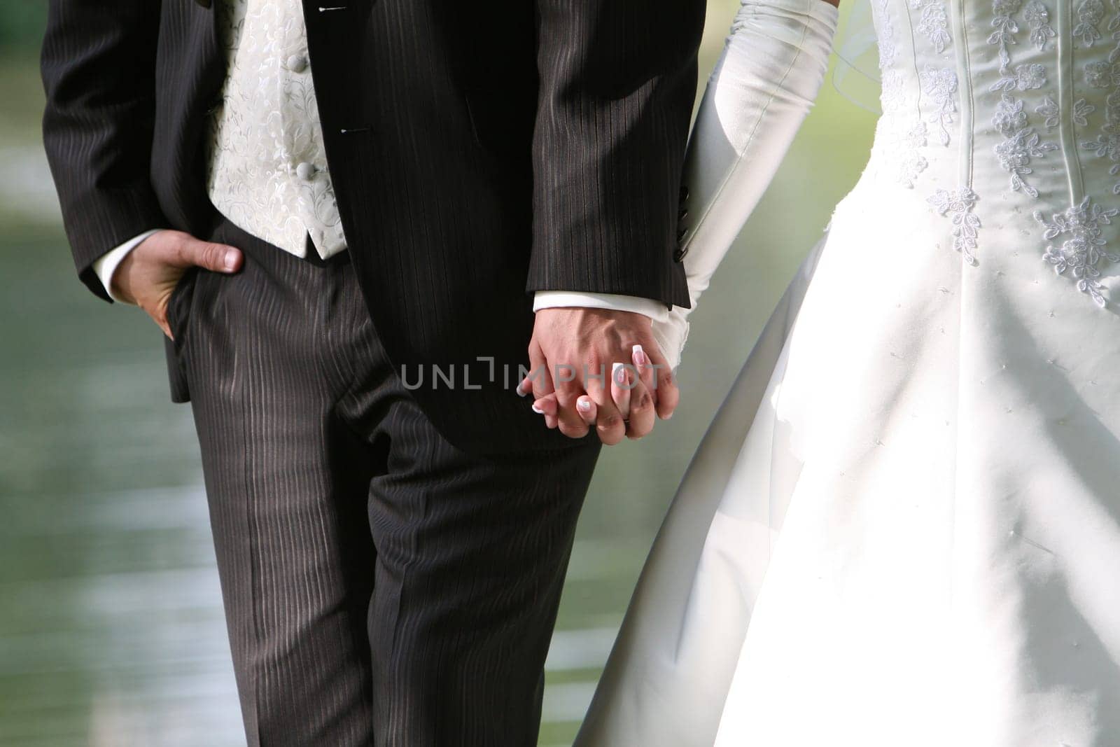 Newlyweds - hand in hand