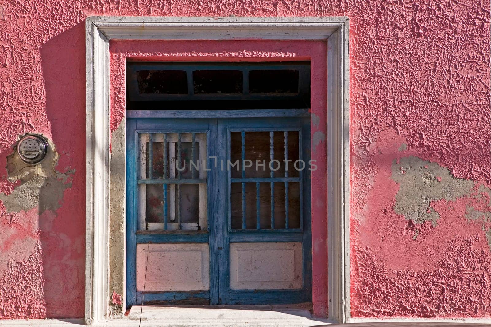 Blue Door and Pink Walls