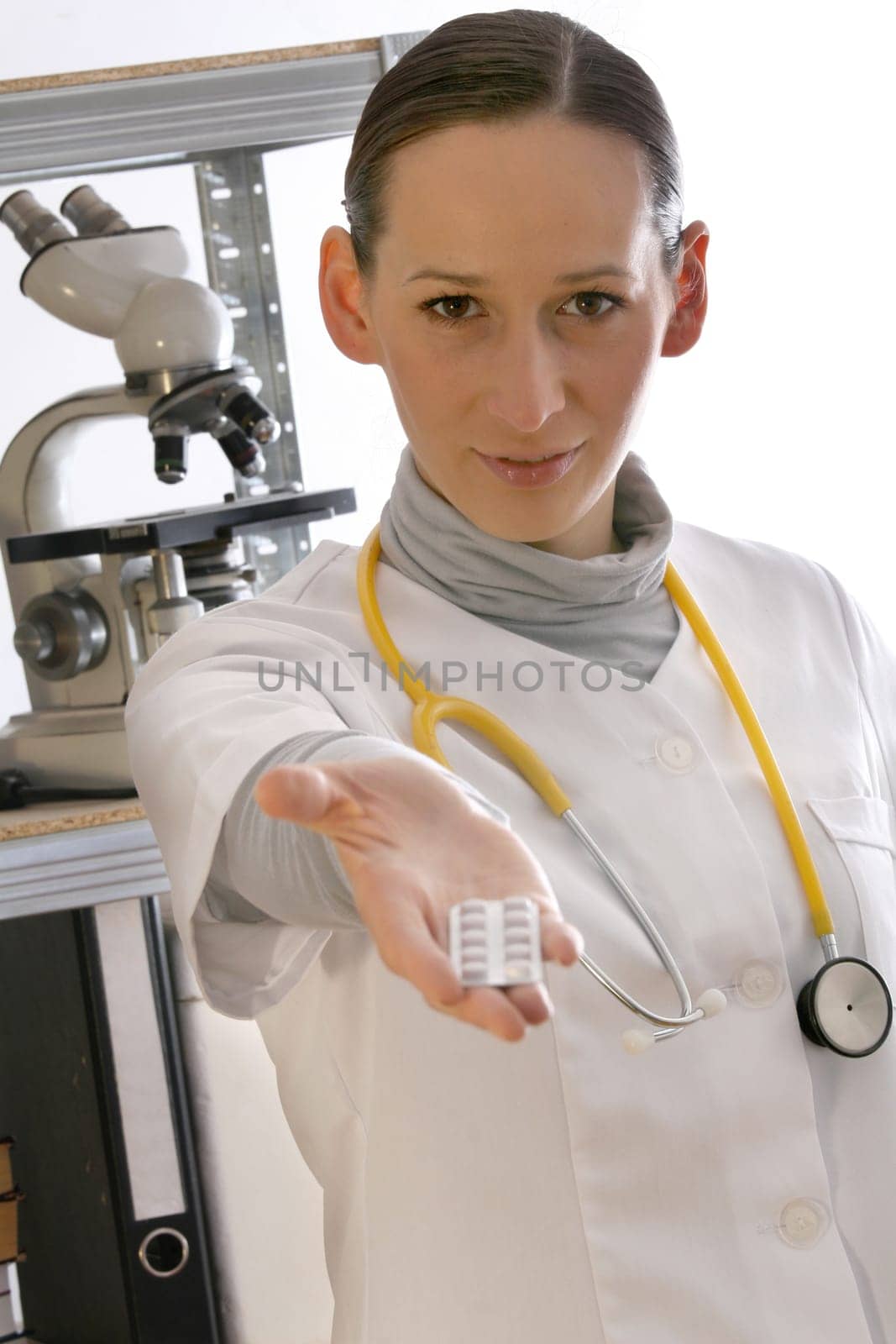 doctor giving pills