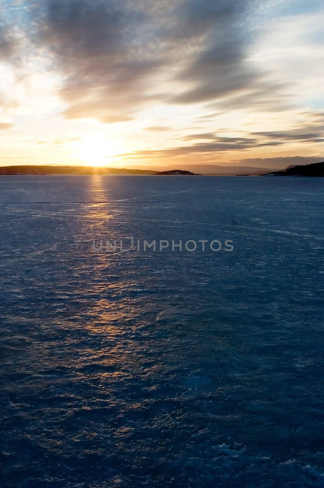Sunset on Frozen Lake