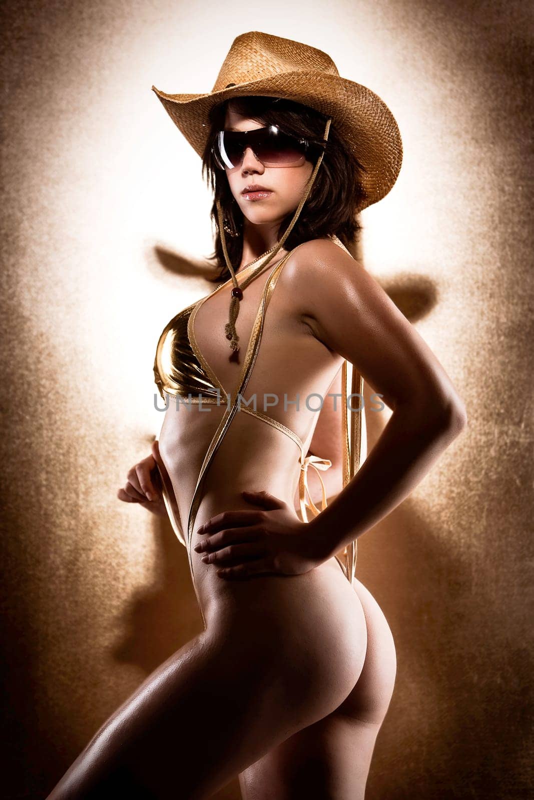woman in golden bikini