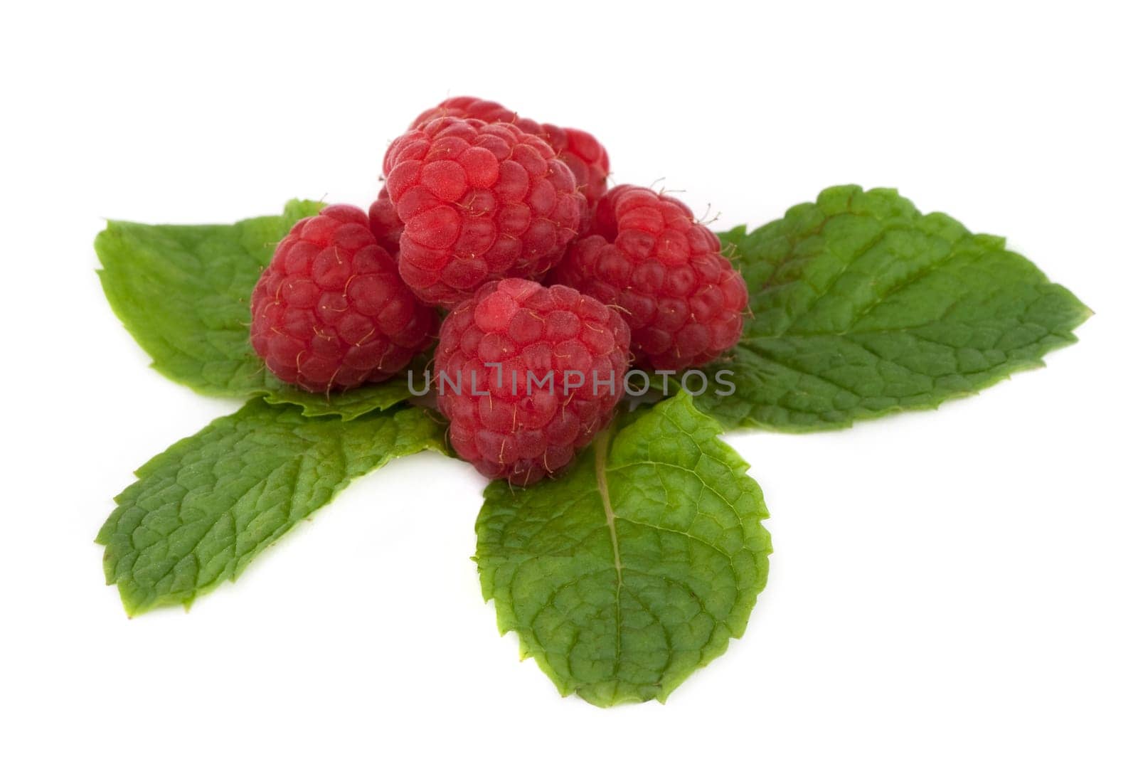 Raspberry on peppermint leaf