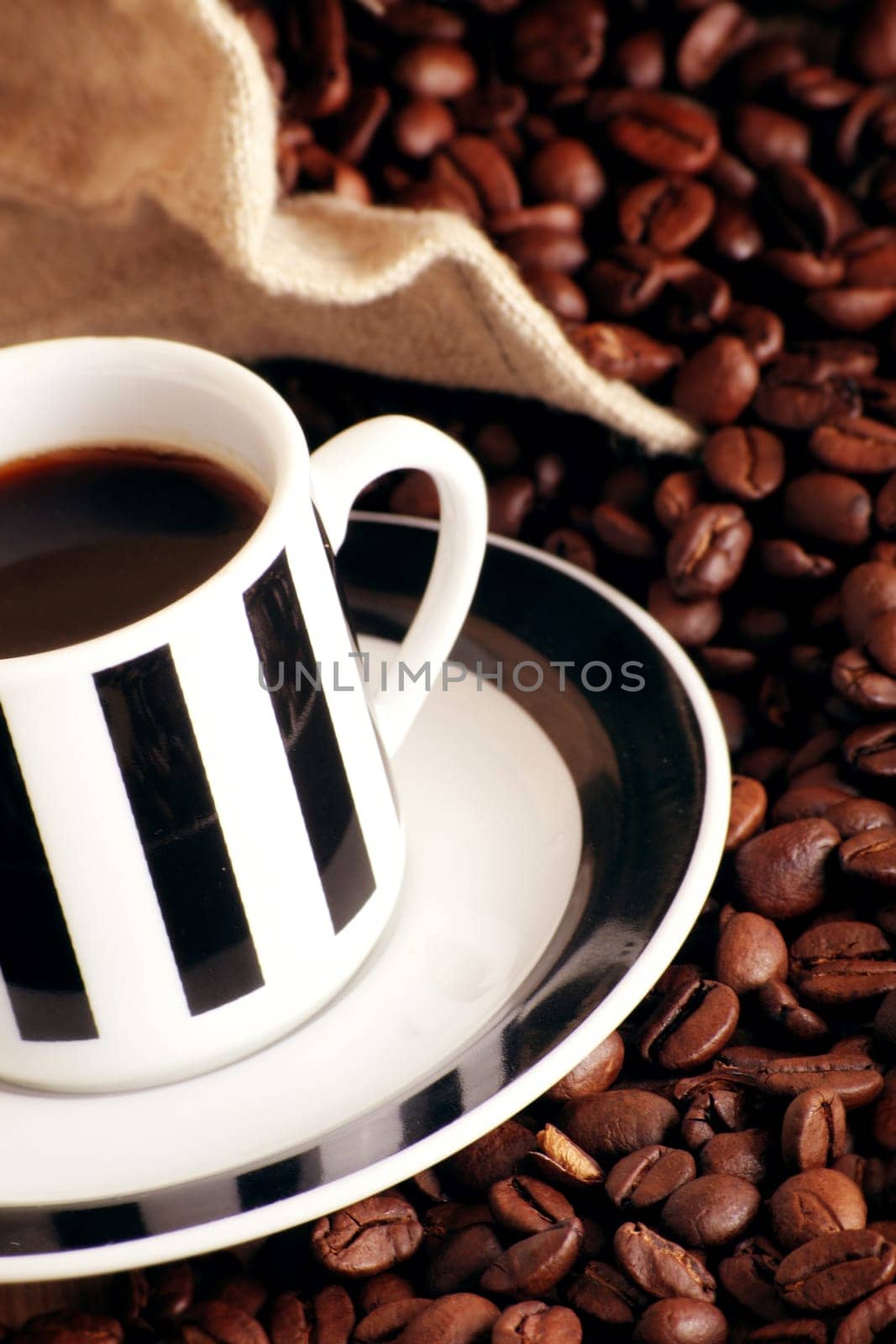 Coffee cup with coffee beans
