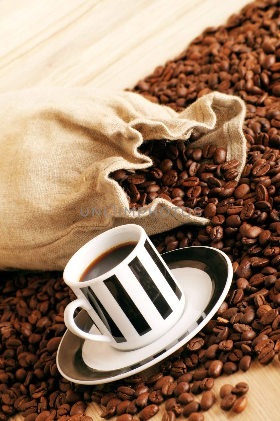 Coffee cup with coffee beans