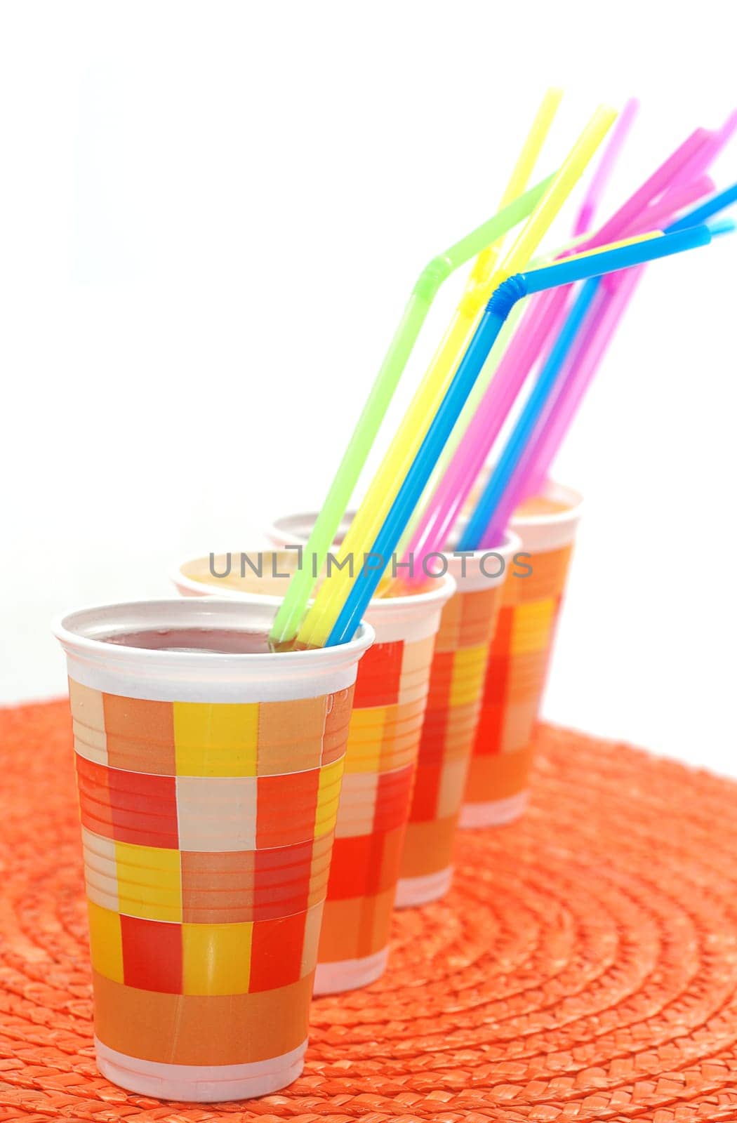 Paper cups with drinking straws