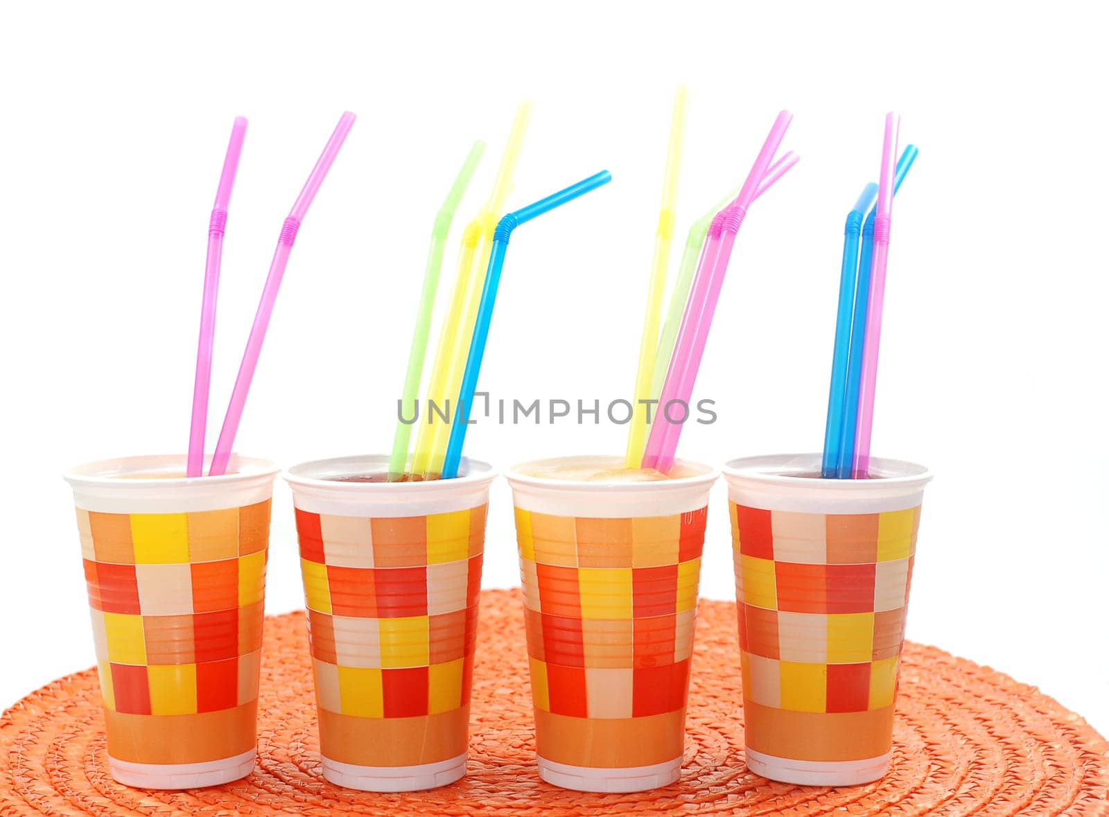 Paper cups with drinking straws