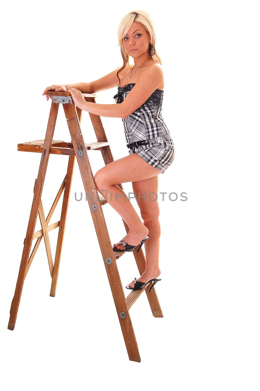 Girl on stepladder.