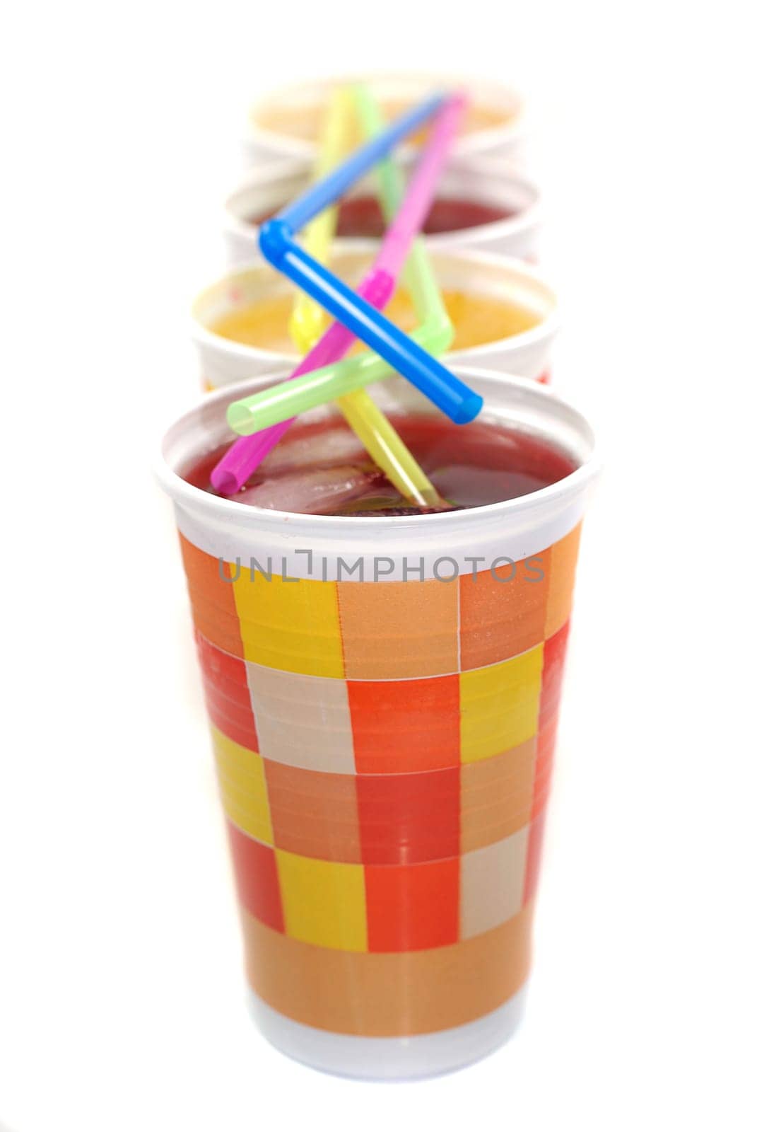 Paper cups with drinking straws