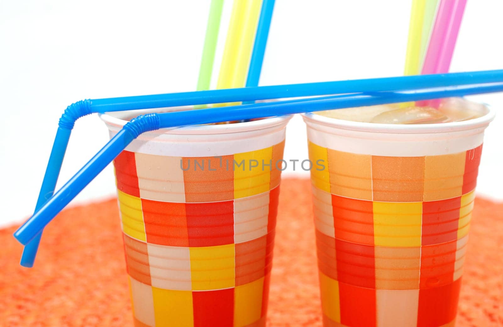Paper cups with drinking straws