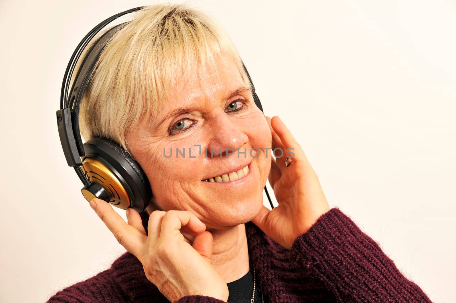 smiling woman with headphones