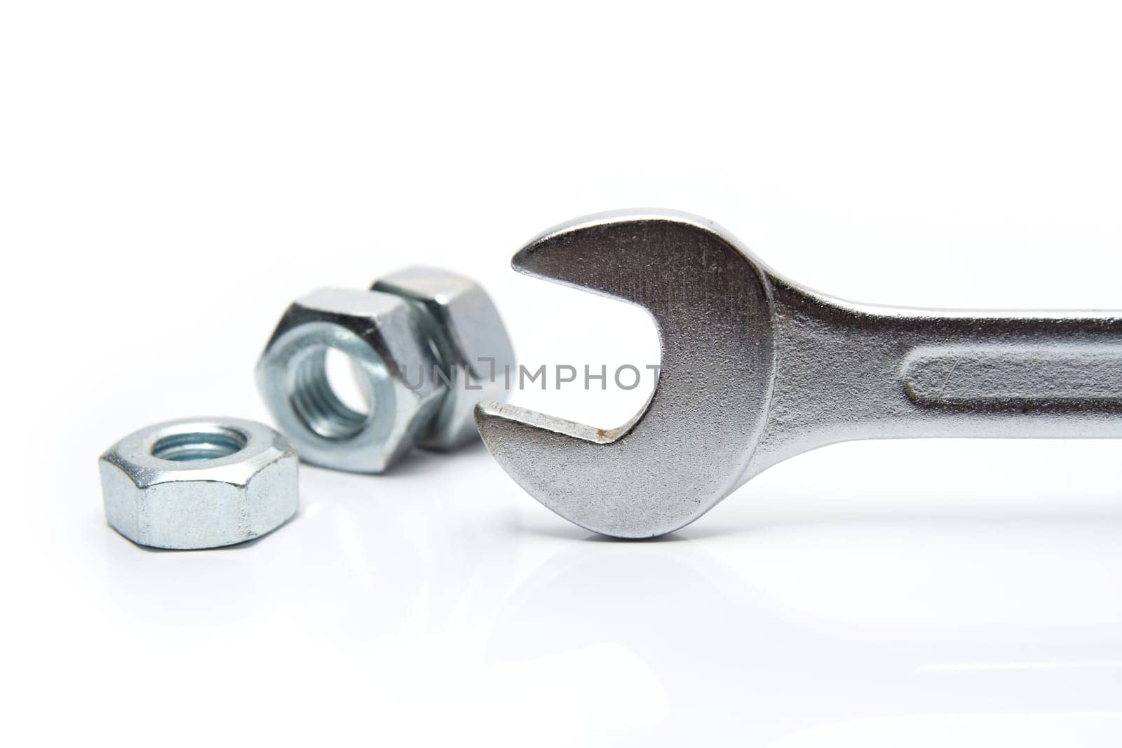 Wrench and nuts