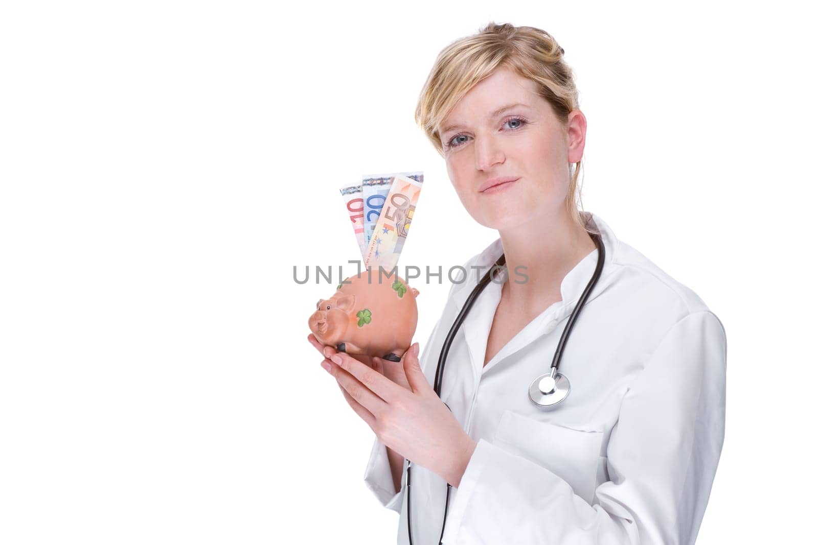 Young female doctor with piggy bank
