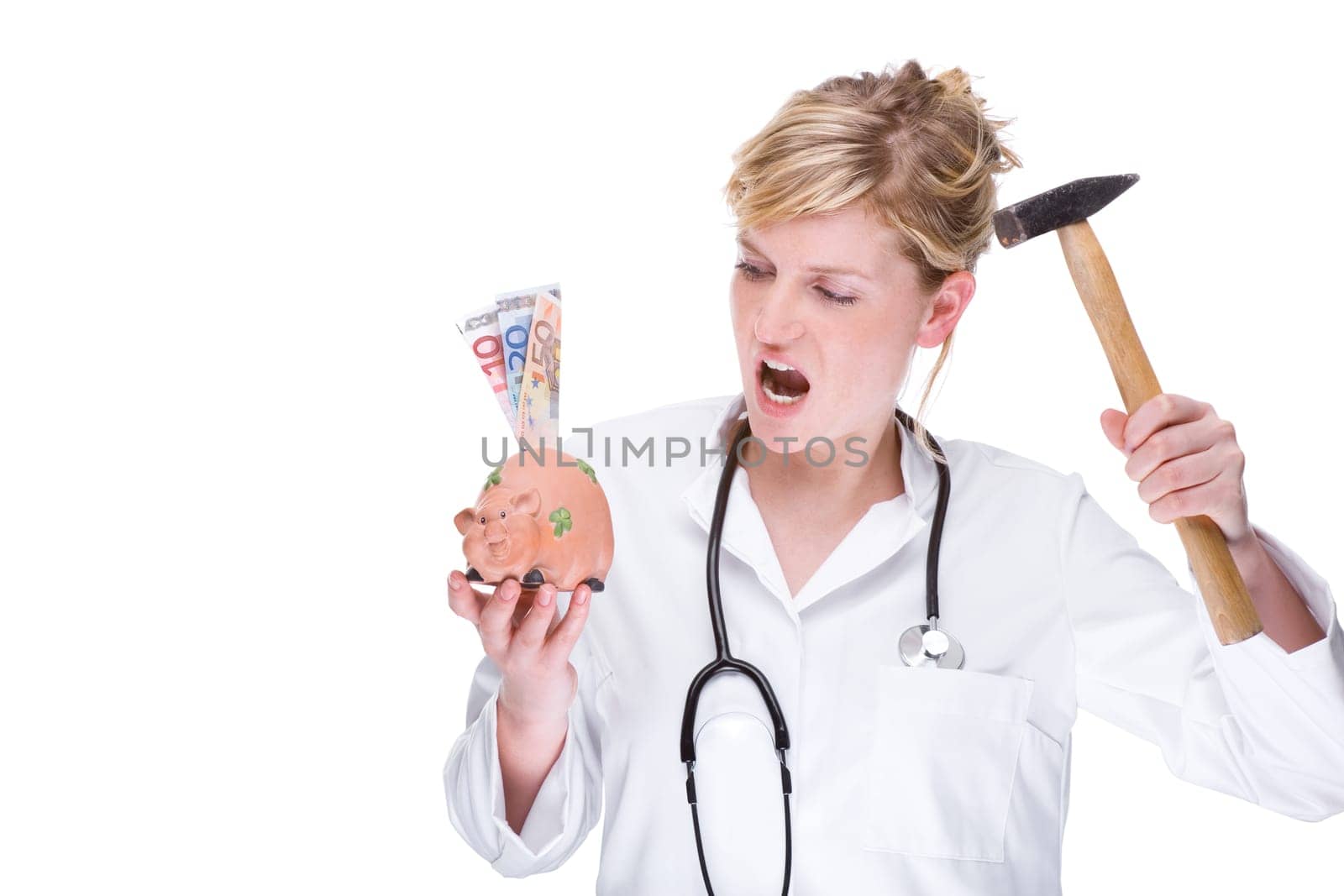 Young female doctor with piggy bank