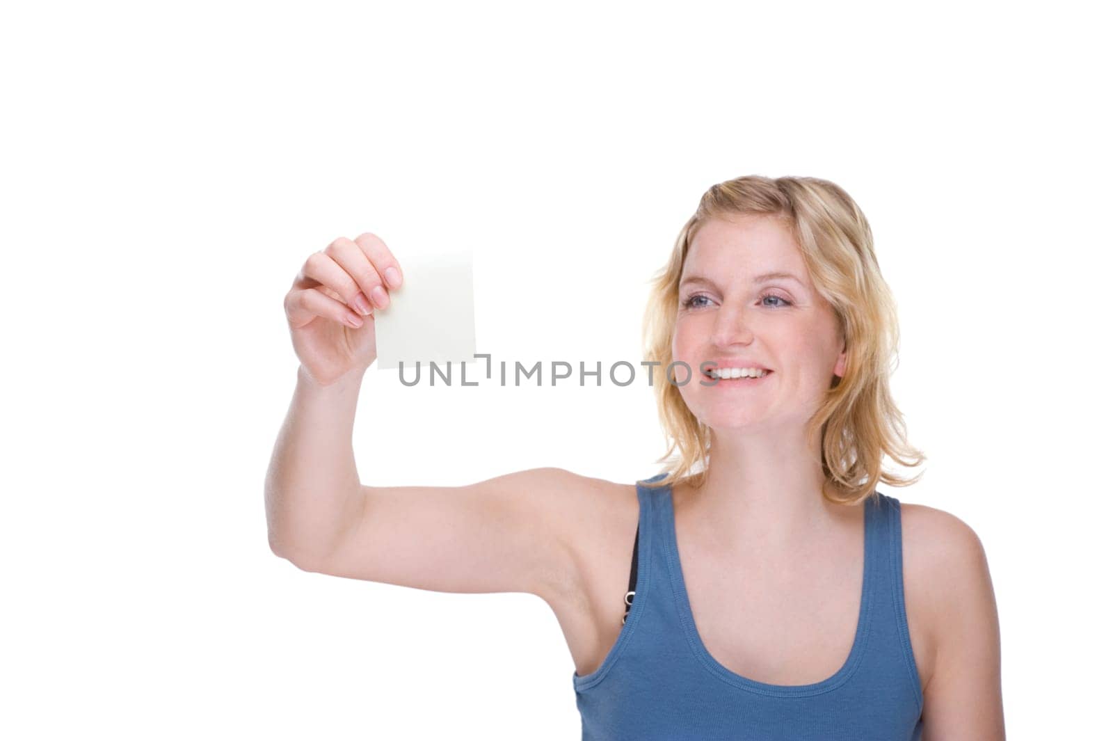 Businesswoman sticking notes on wall