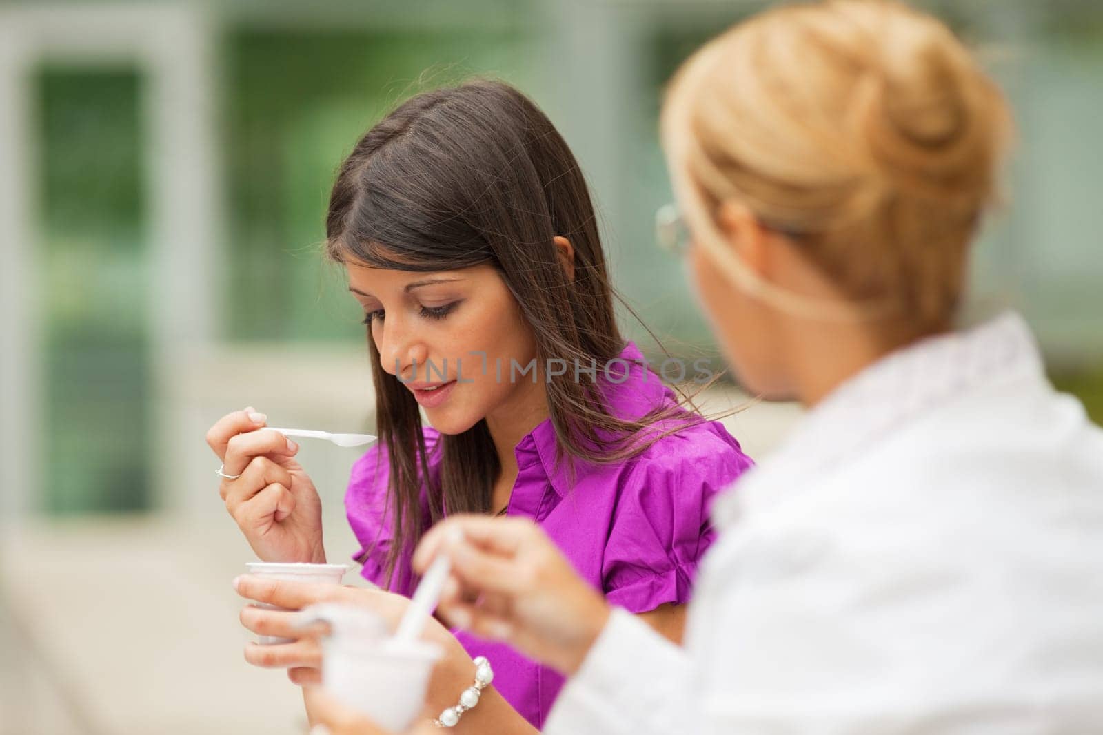 businesswomen drinking coffee