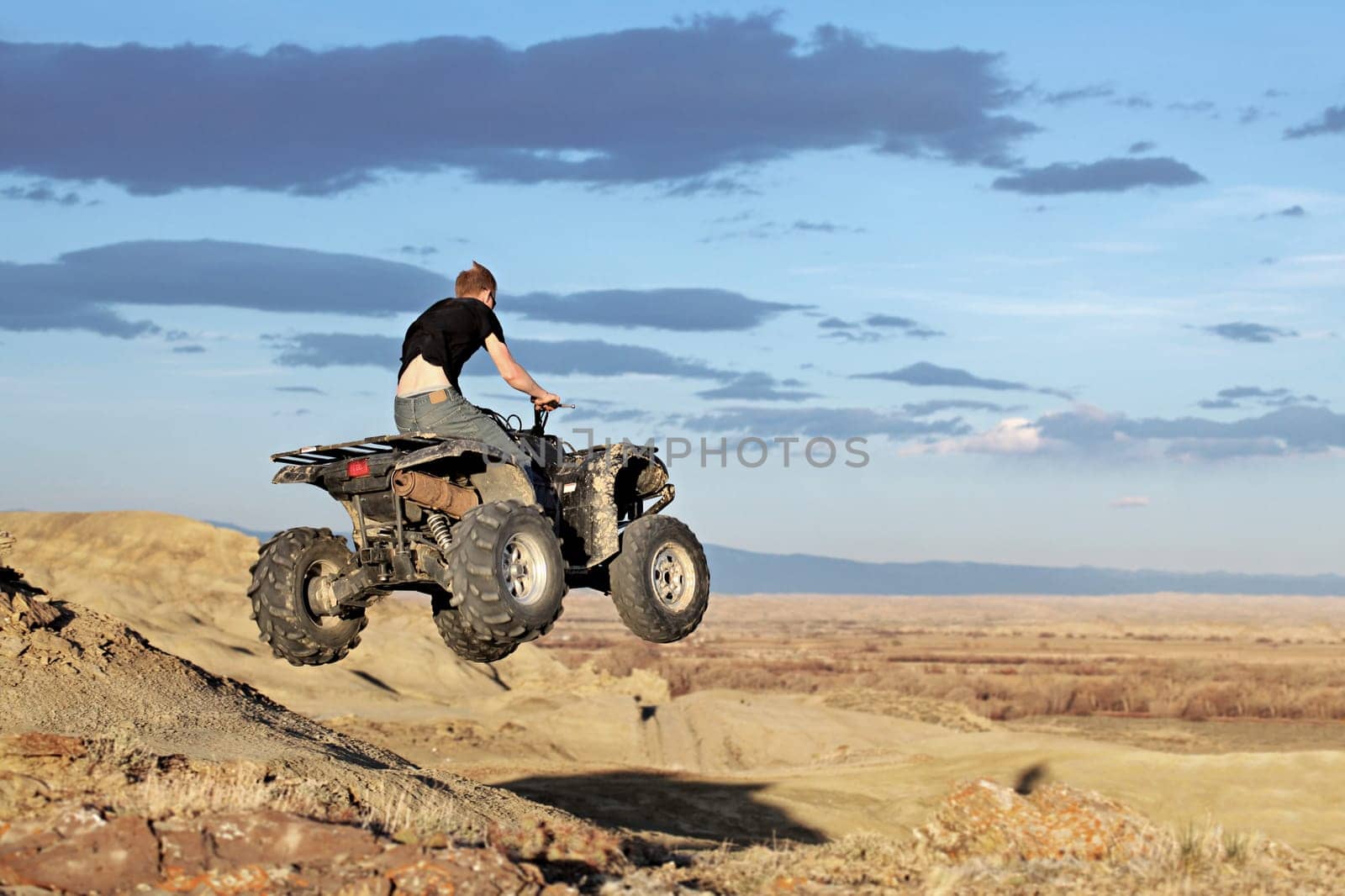 teen on quad - four wheeler