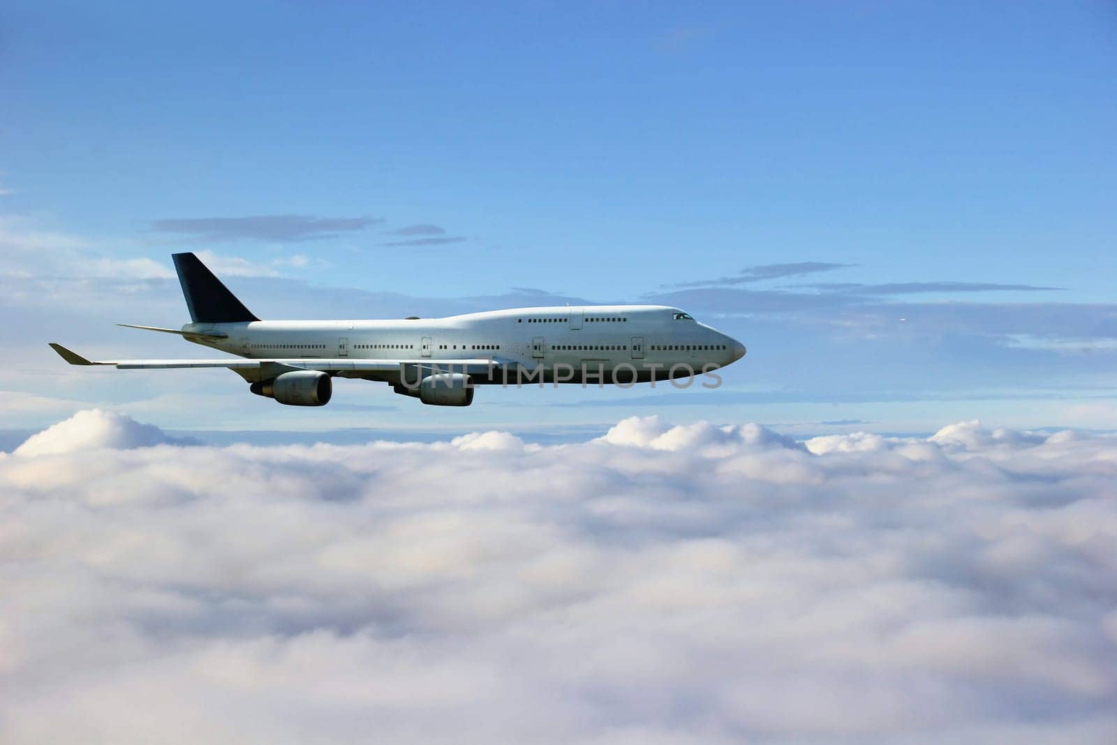 Airplane above the clouds