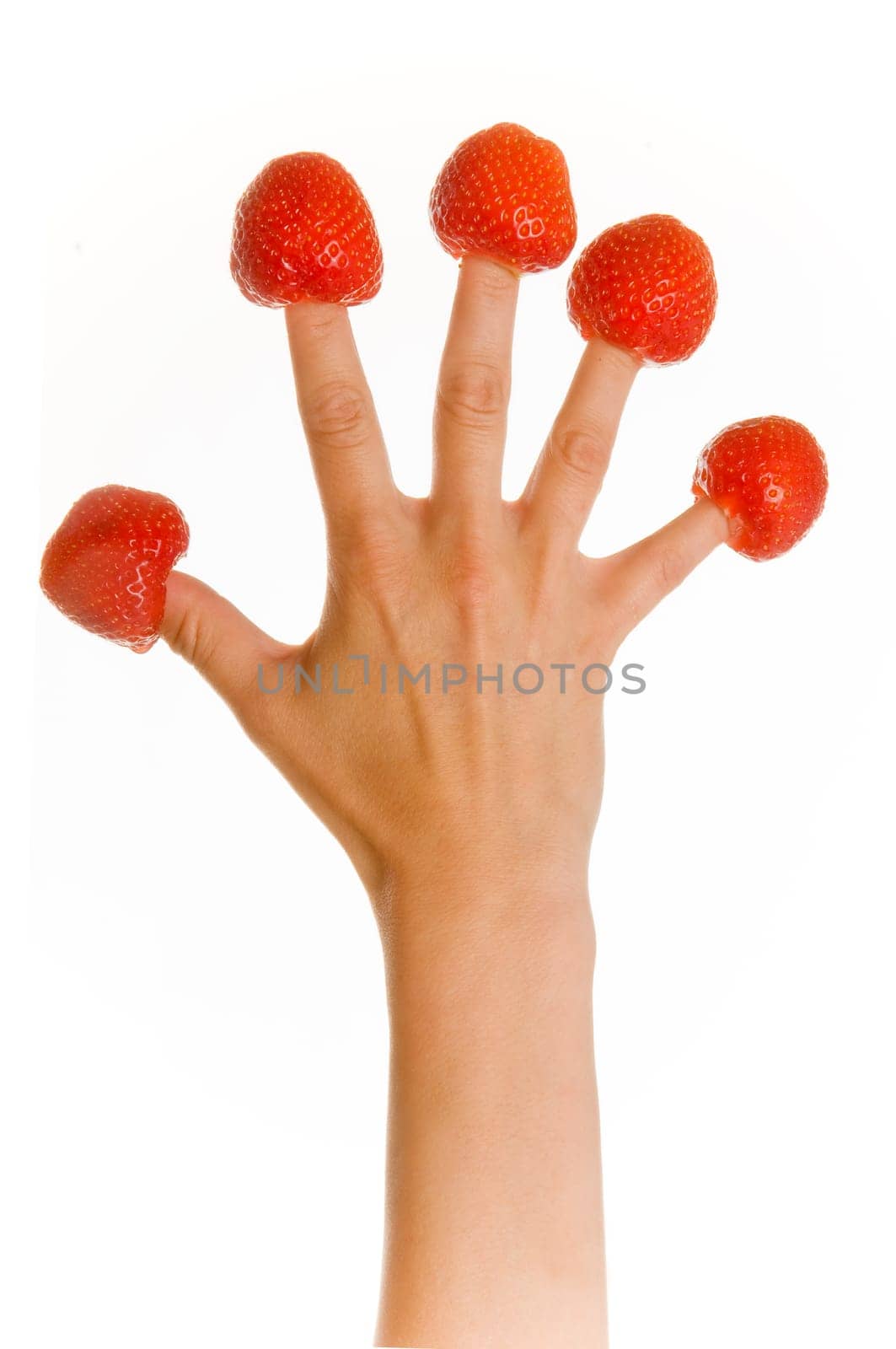 Hand with strawberries