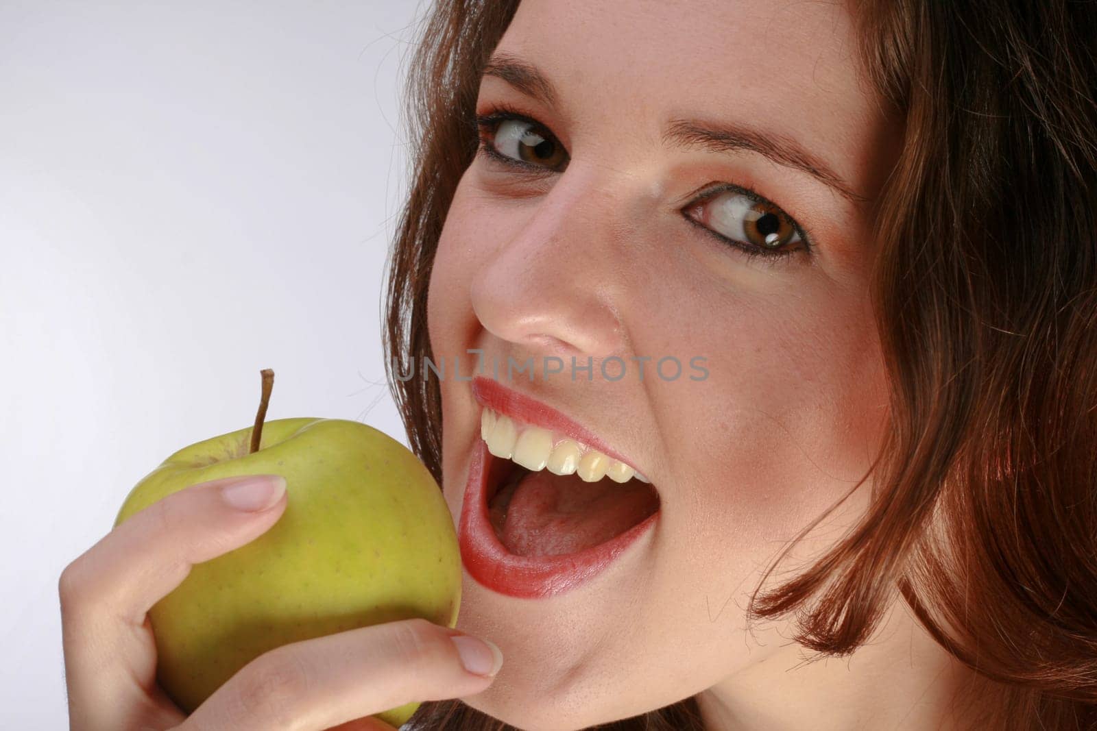 Beautiful Woman Just About To Bite An Apple