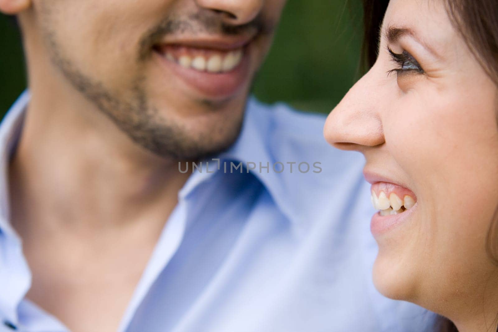Closeup Of Man And Woman Smiling