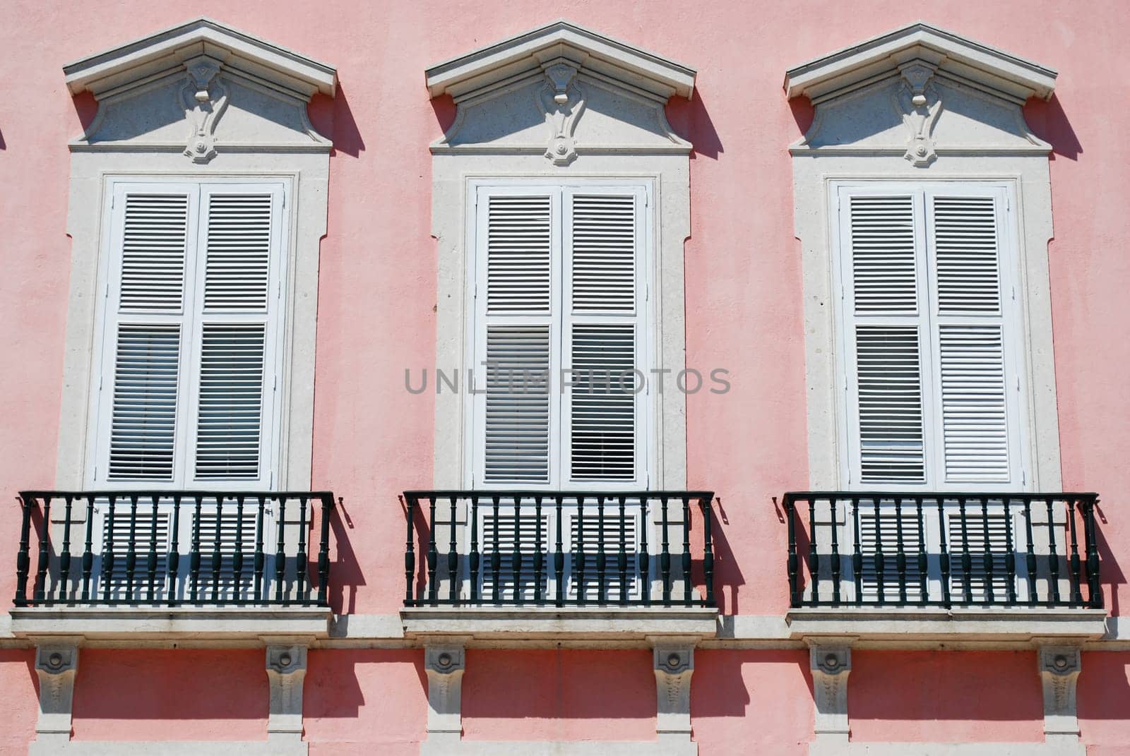 Ancient facade and windows of a typical building