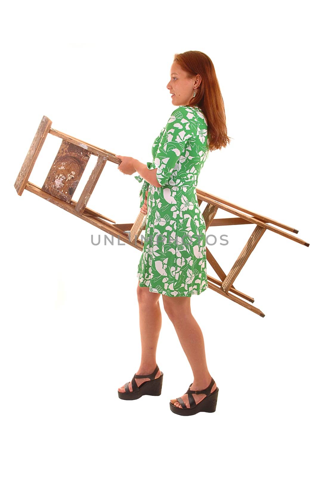 Girl caring stepladder.
