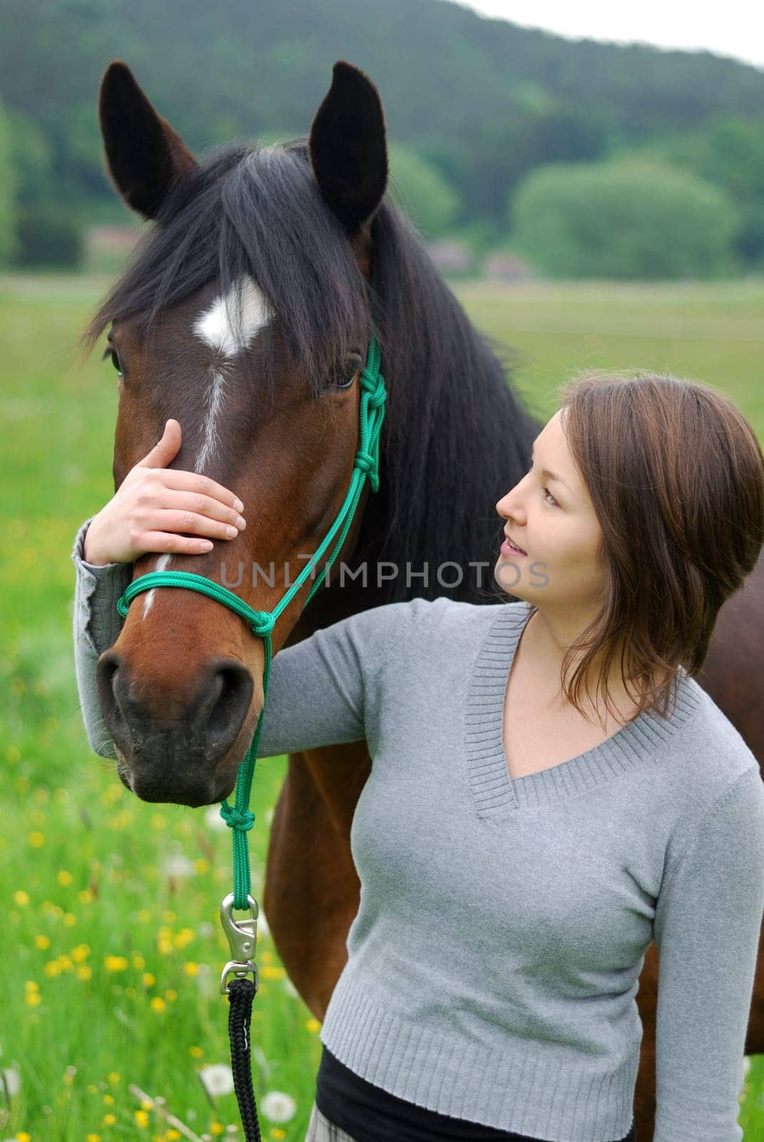 Young woman with horse