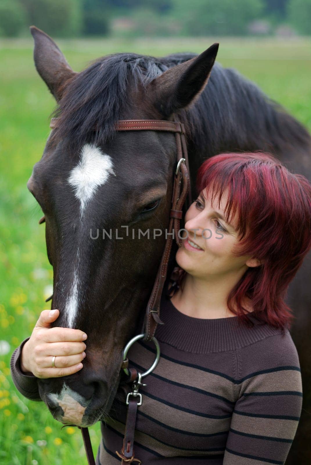 Young woman with horse