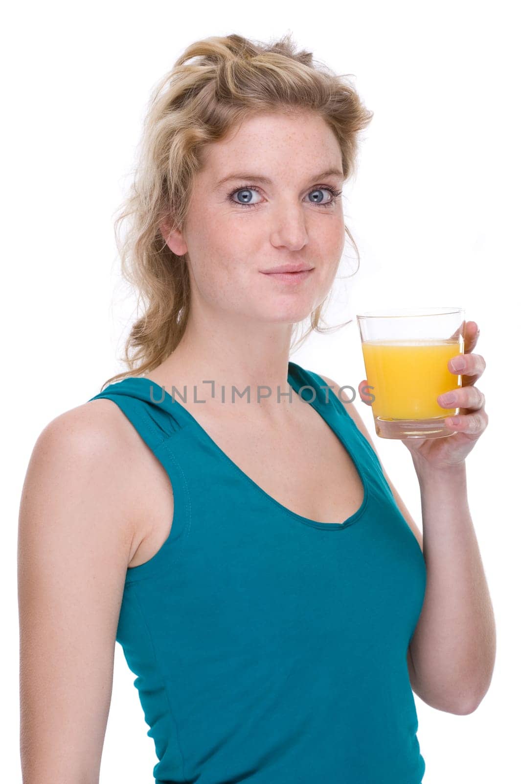 Young woman with glass of orange juice