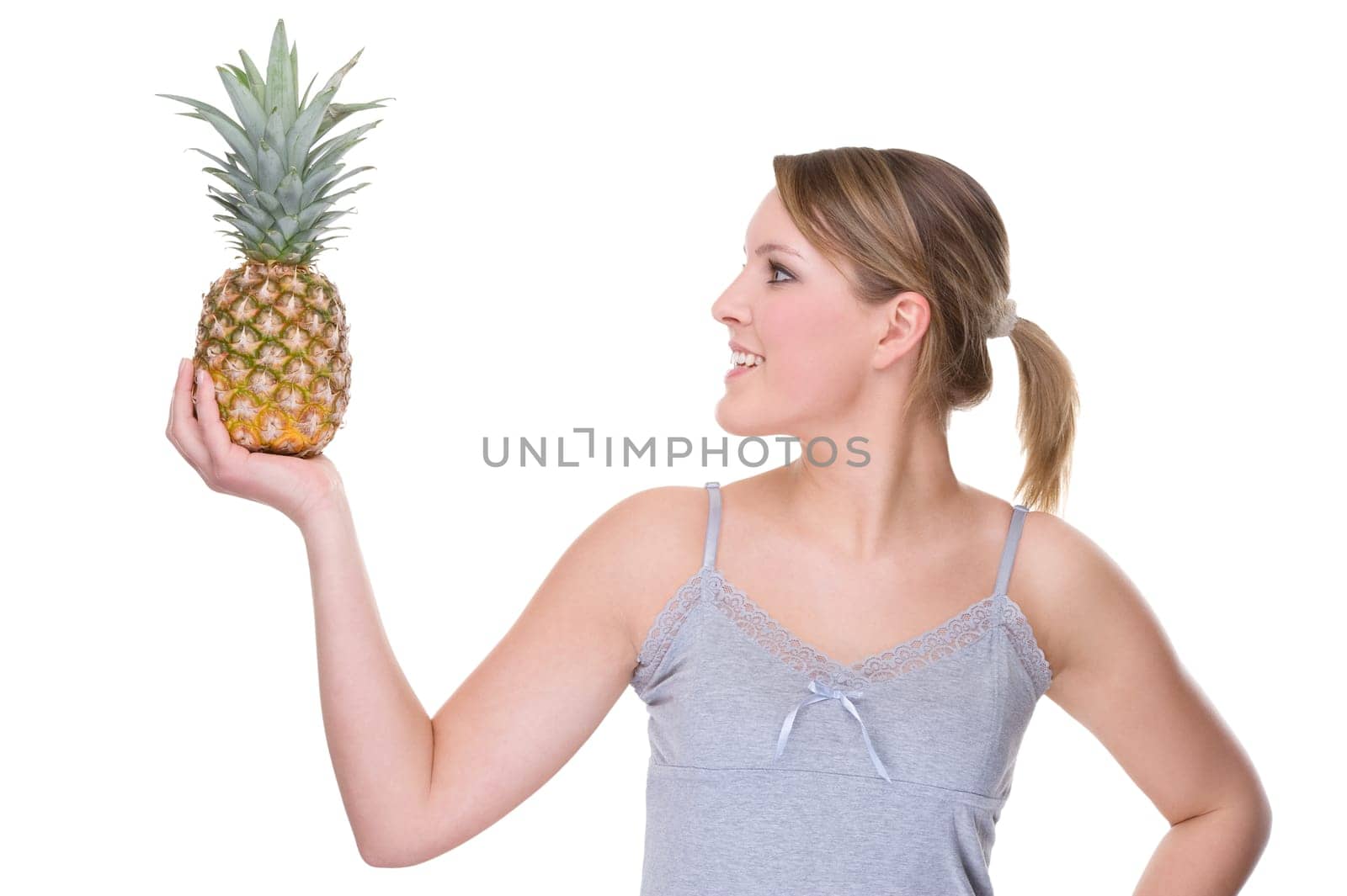 Young woman with pineapple
