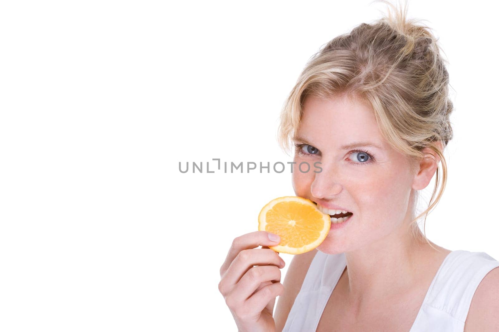 Young woman with orange slice