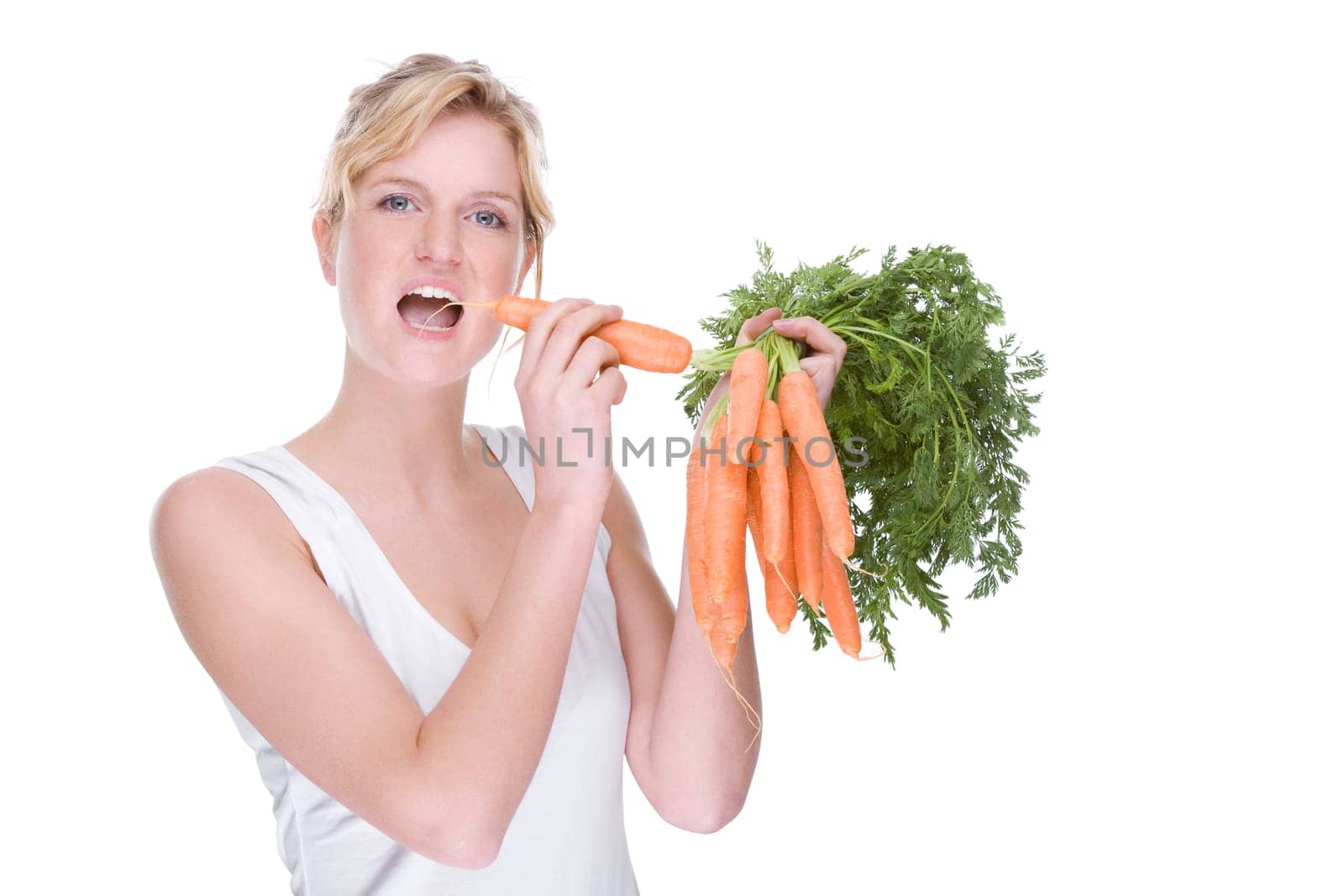 Young woman with carrots