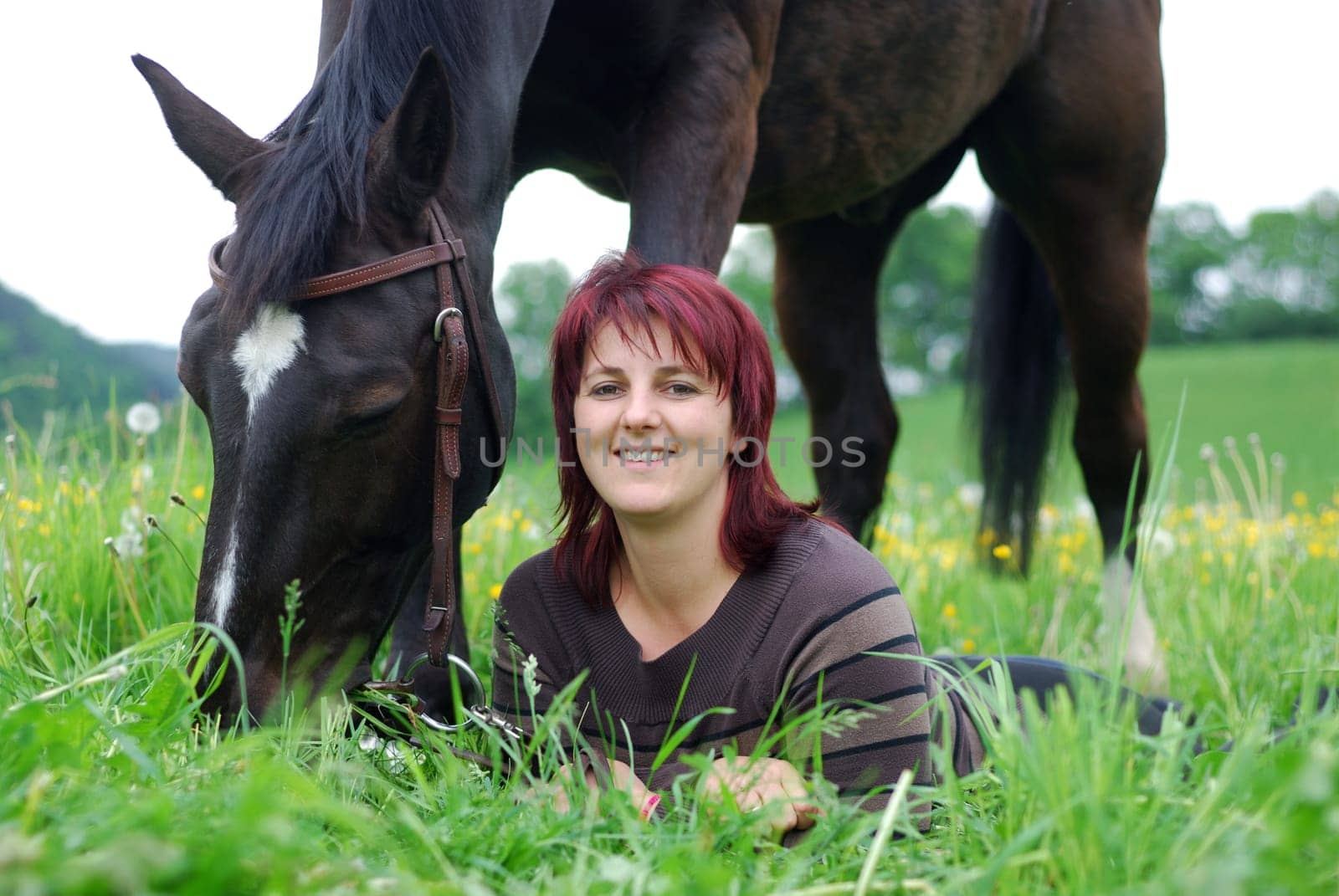 Young woman with horse