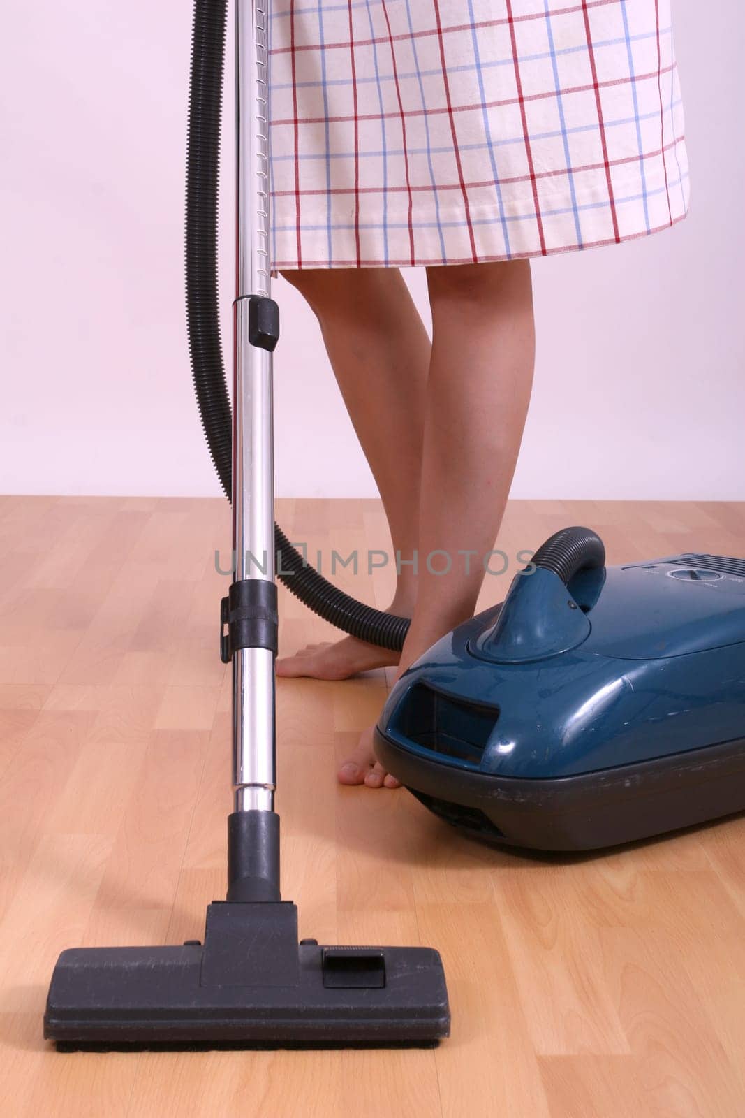 woman with vacuum cleaner