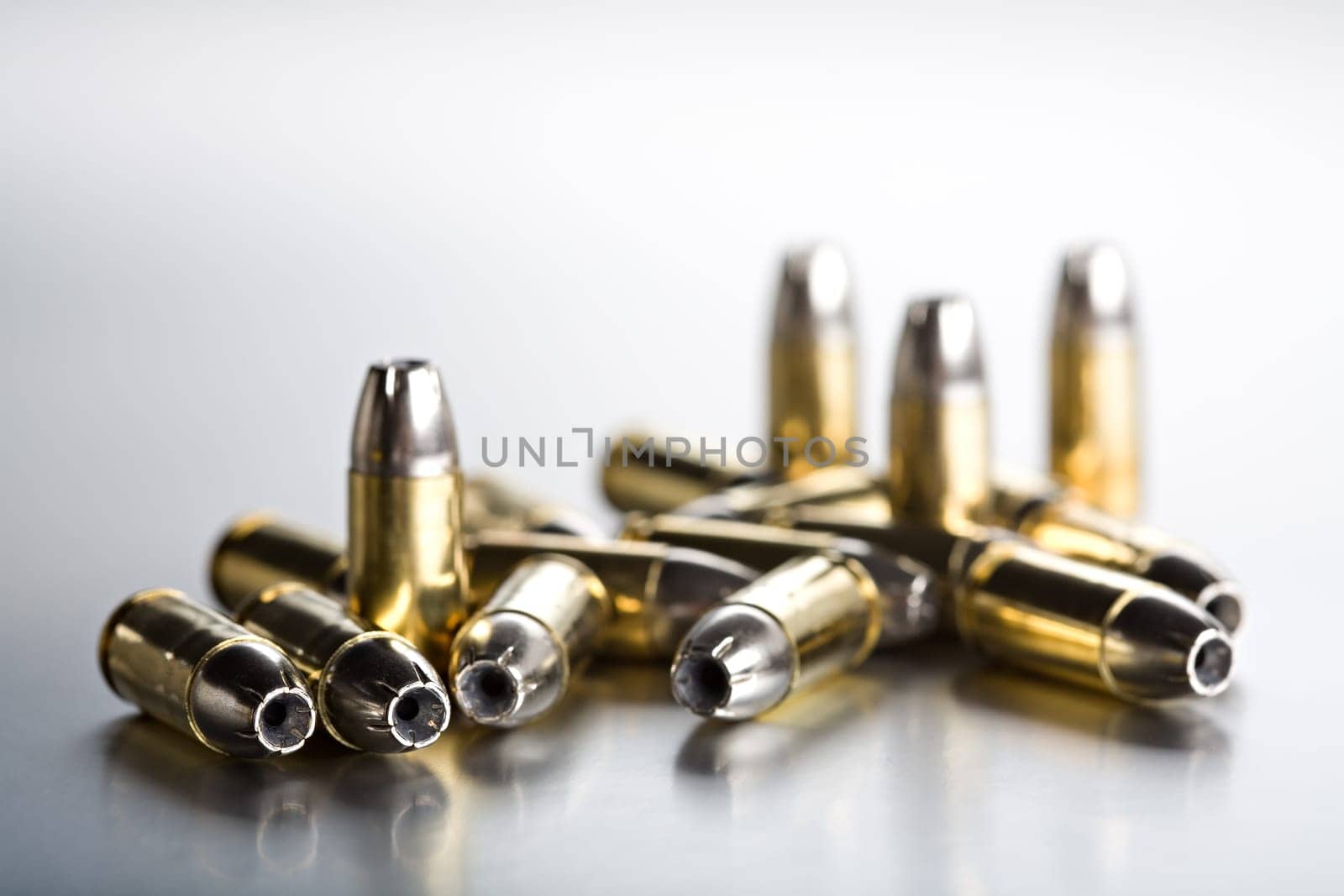 bullets closeup on cold brushed metal