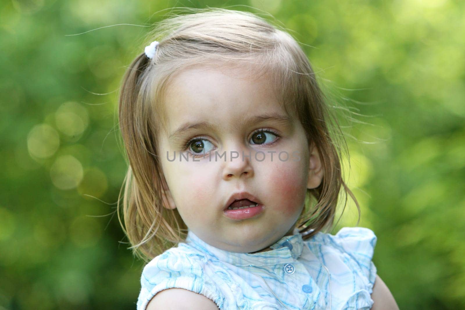 Portrait of a little bright girl