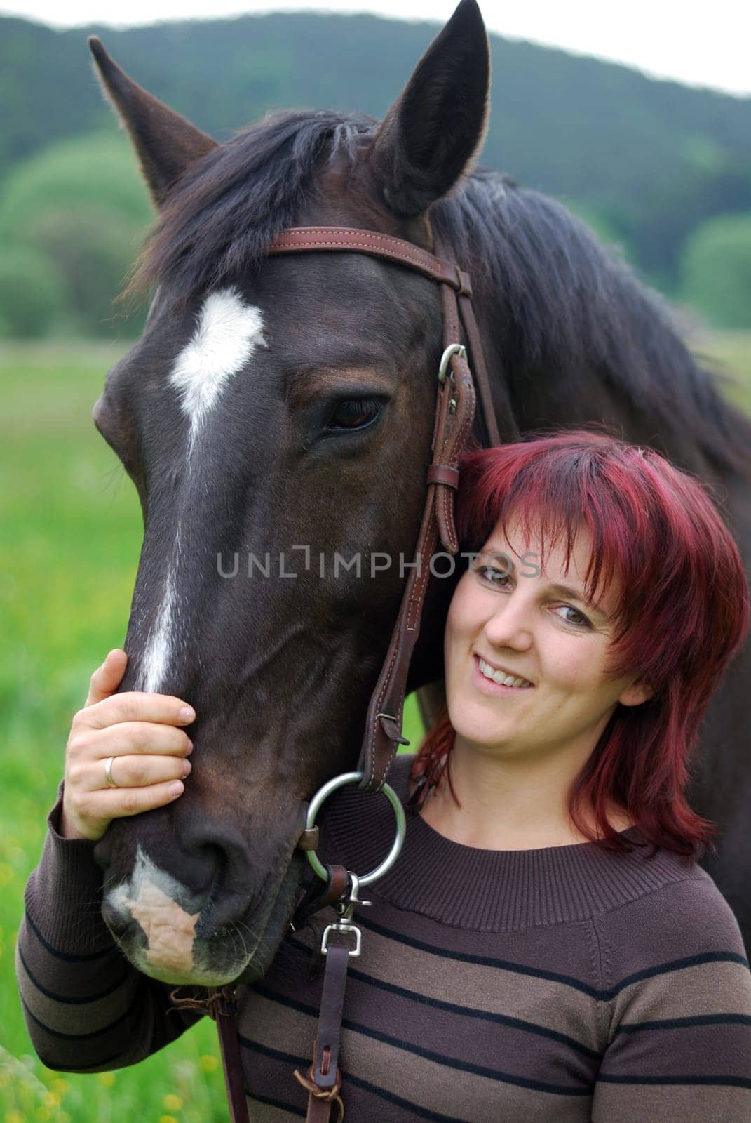 Young woman with horse