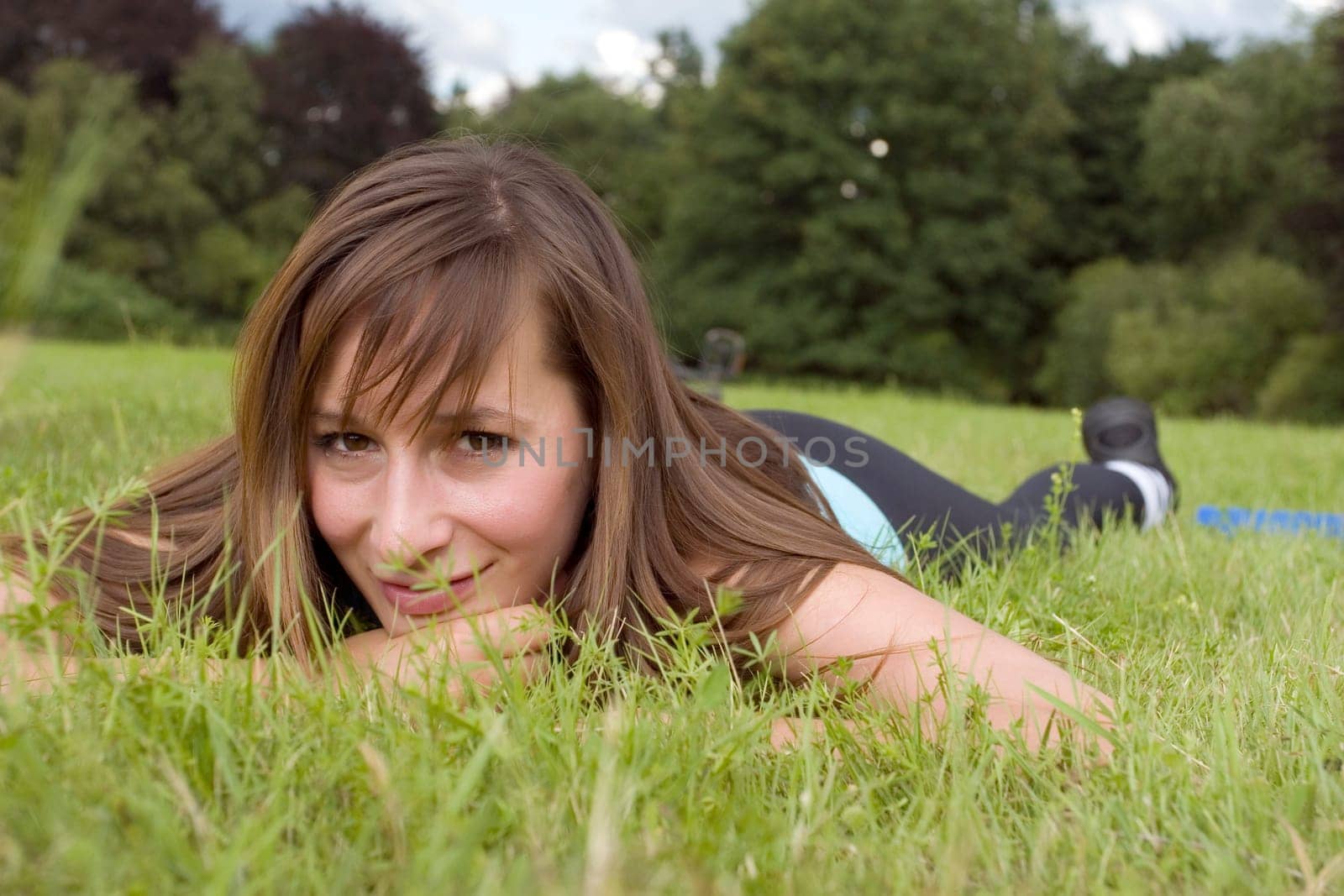 Woman relaxing on grass