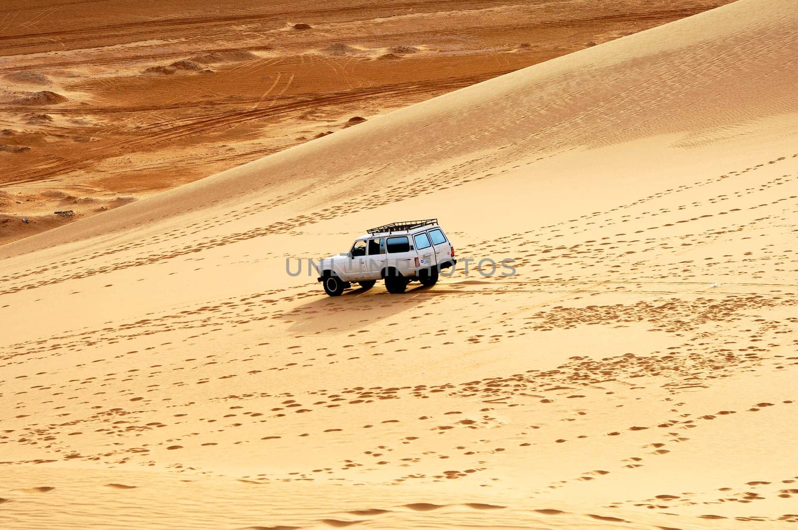 Dune bashing in the sand dunes of the Sahara