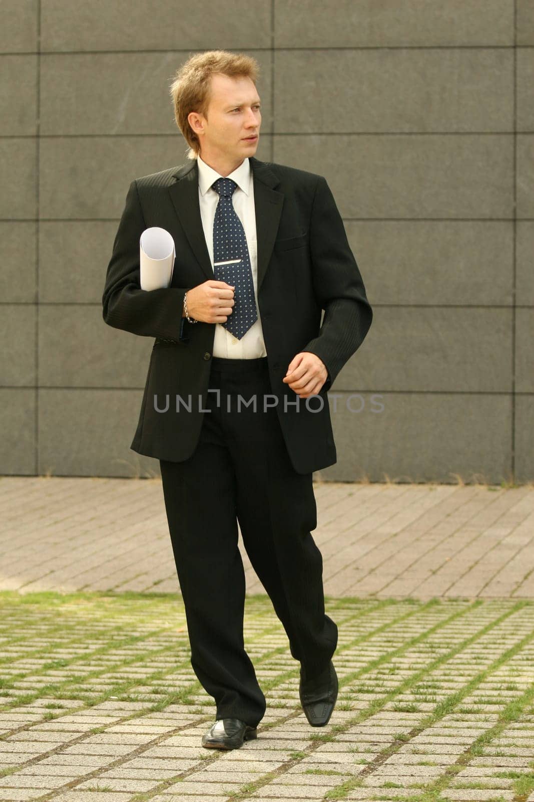 businessman walking on the street