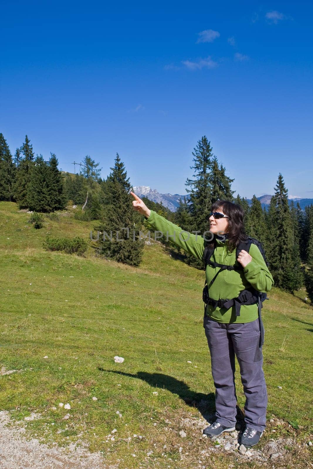 Girl with the backpack indicating