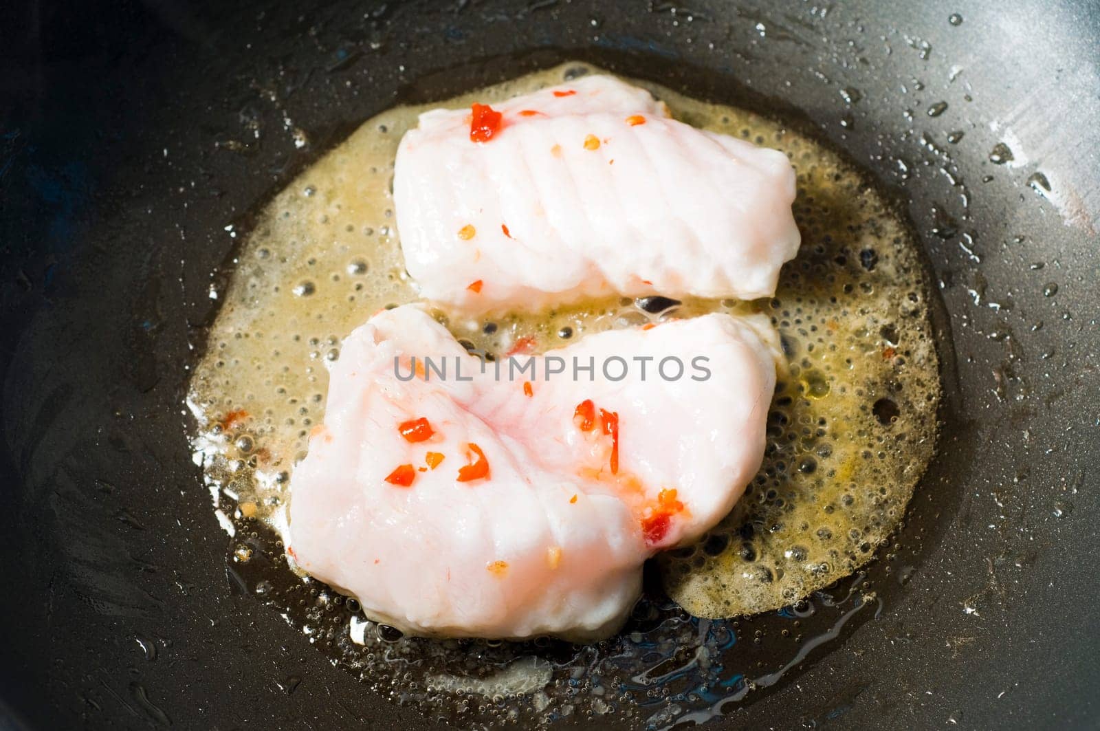 monk fish in wok