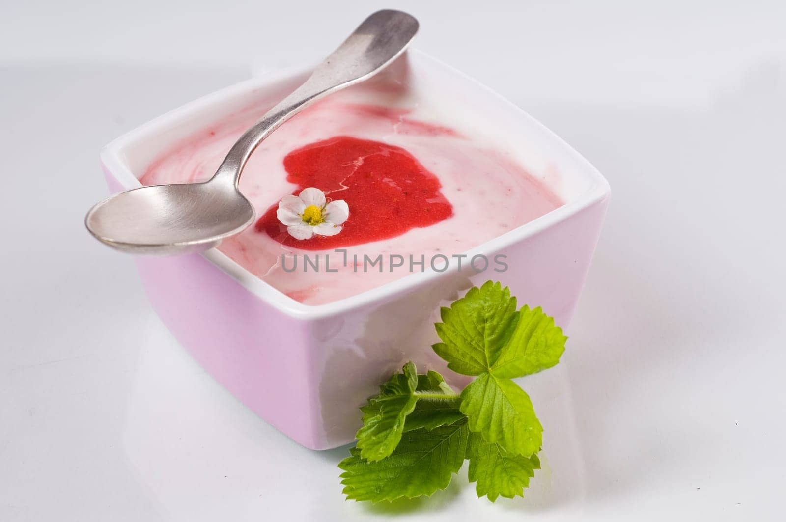 Strawberry curd in pink bowl